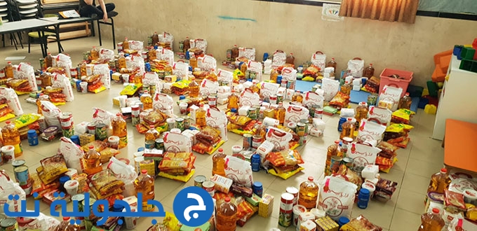جمعية الإغاثة المحليه في جلجولية تقوم بإعداد الطرود الغذائية للبيوت المستورة